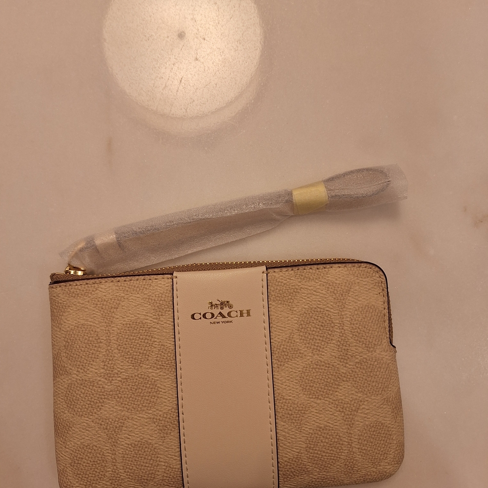 SOLD!!! NWT Coach Sand Zip Wristlet